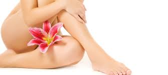 woman waxing and flower